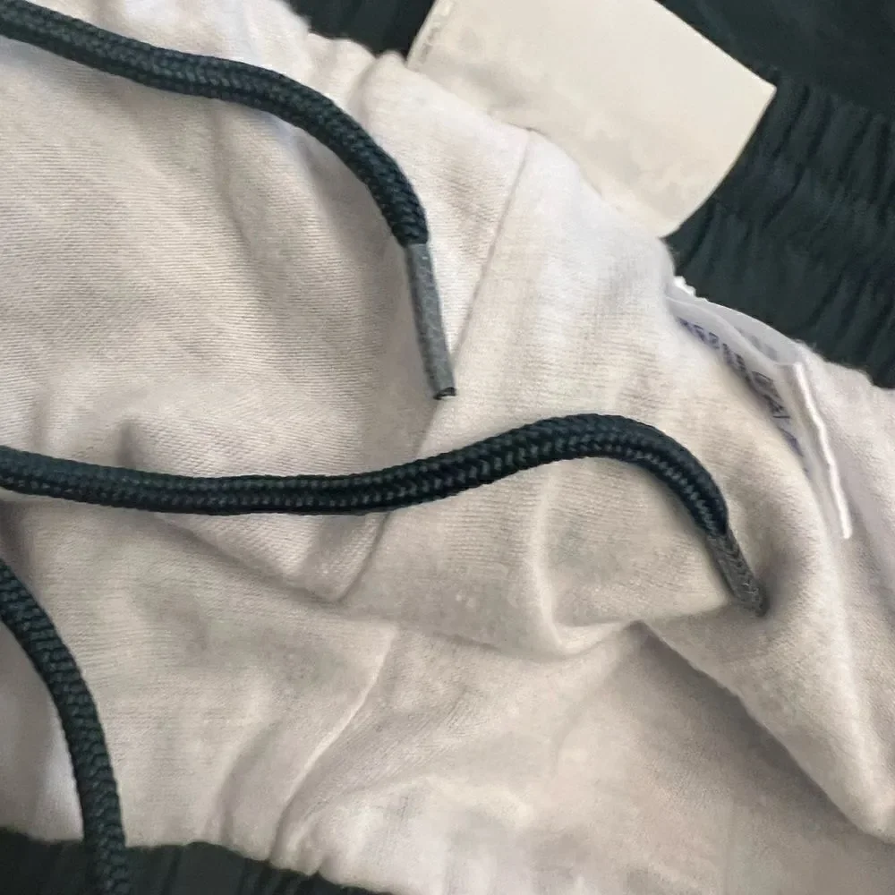 Men’s Vintage Reebok Nylon ankle zip track pants.